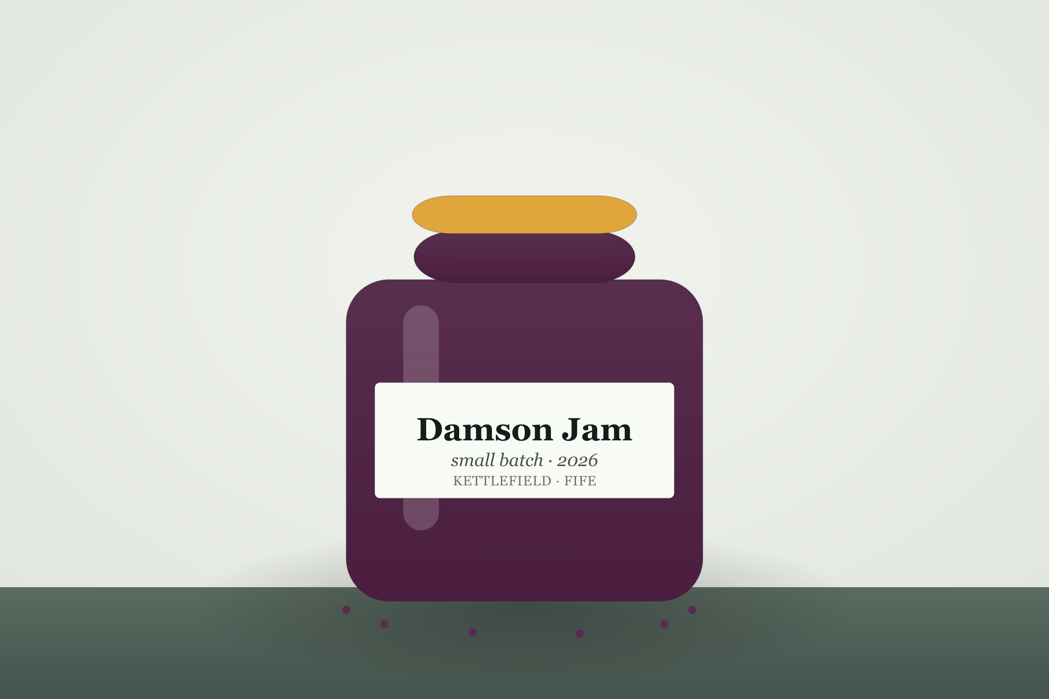 A jar of Kettlefield damson jam, deep purple-red, with a hand-labelled lid