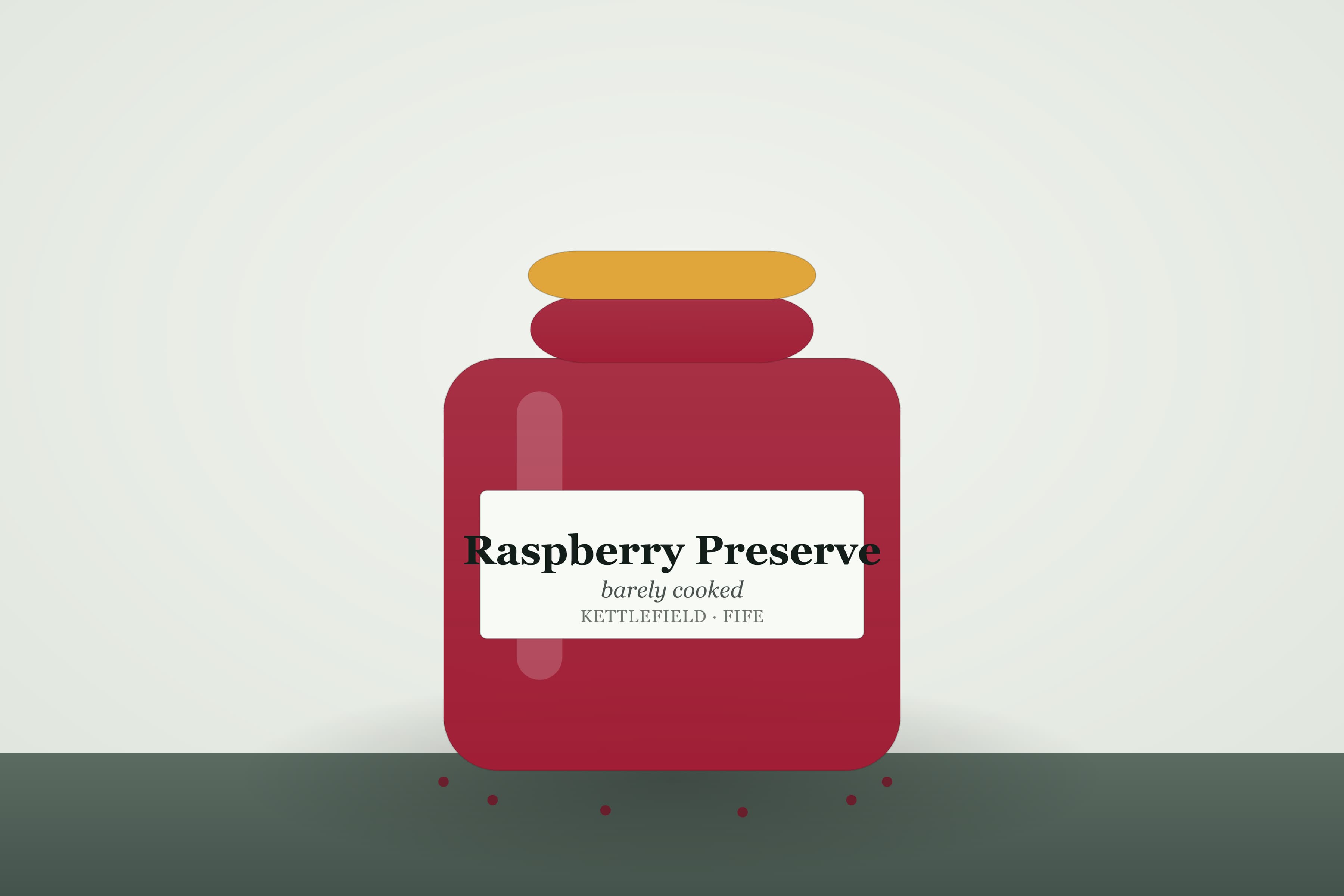 A jar of Kettlefield raspberry preserve, bright red with whole fruit visible